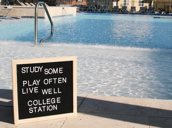 Sign board by the pool